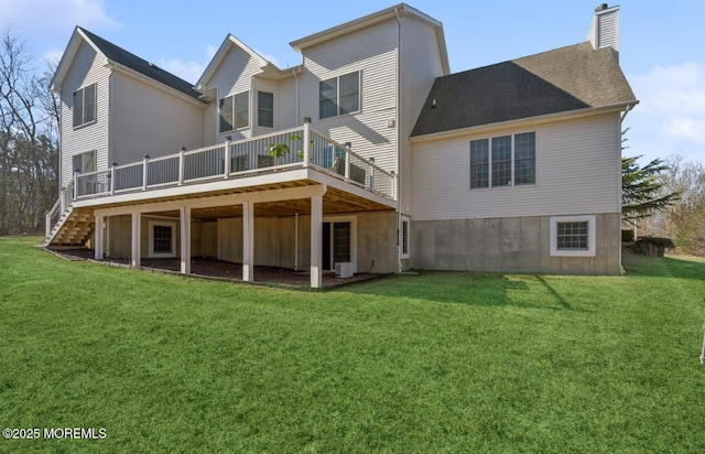 back of house with stairs, a lawn, a chimney, and a wooden deck