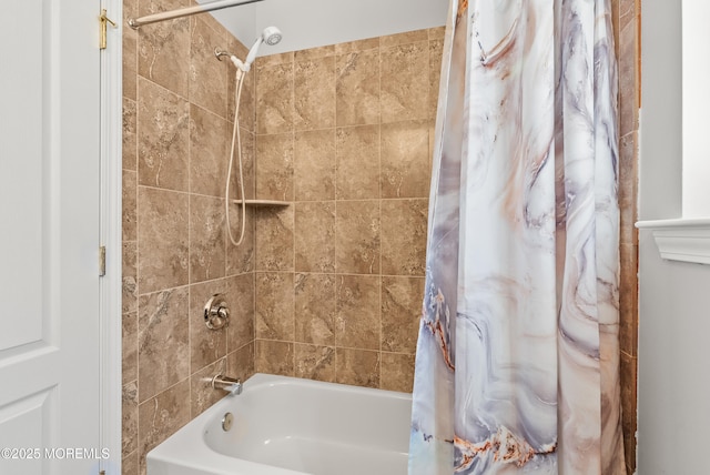 bathroom with shower / bath combination with curtain