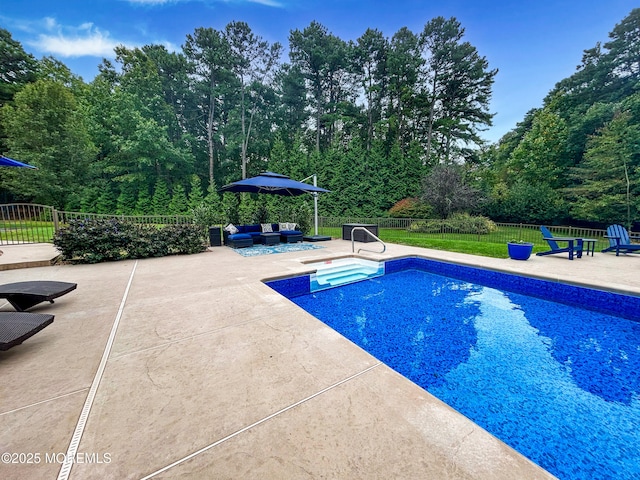 view of pool with a patio area, fence, an outdoor living space, and a fenced in pool