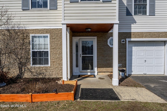 entrance to property with a garage