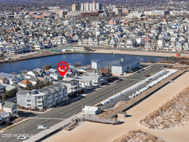 drone / aerial view with a water view