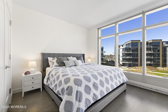 bedroom featuring dark wood-style floors