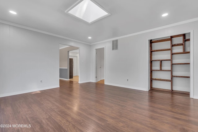 unfurnished room with crown molding, recessed lighting, visible vents, and dark wood finished floors