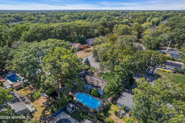 bird's eye view featuring a view of trees