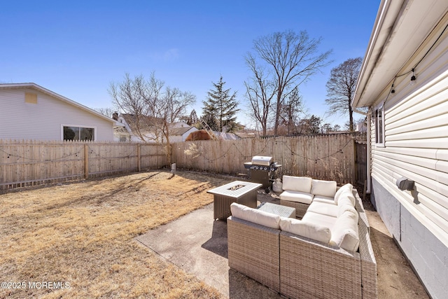 view of patio featuring a fenced backyard, grilling area, and an outdoor hangout area