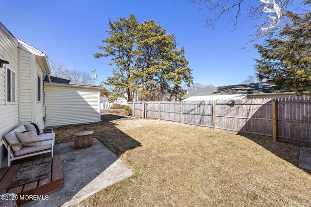 view of yard with a fenced backyard