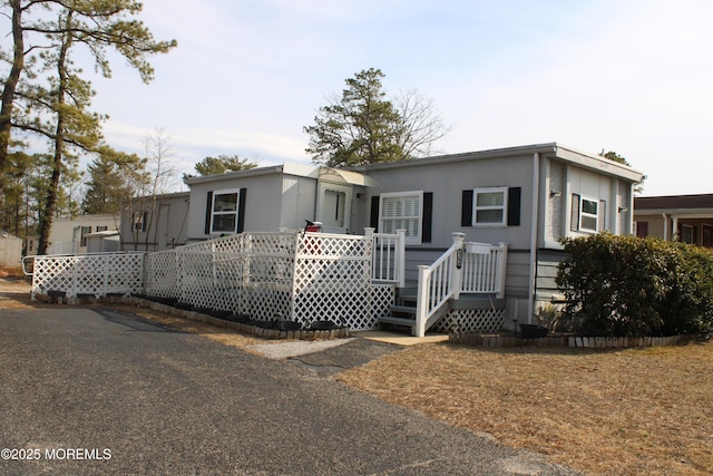 view of front of property with a deck