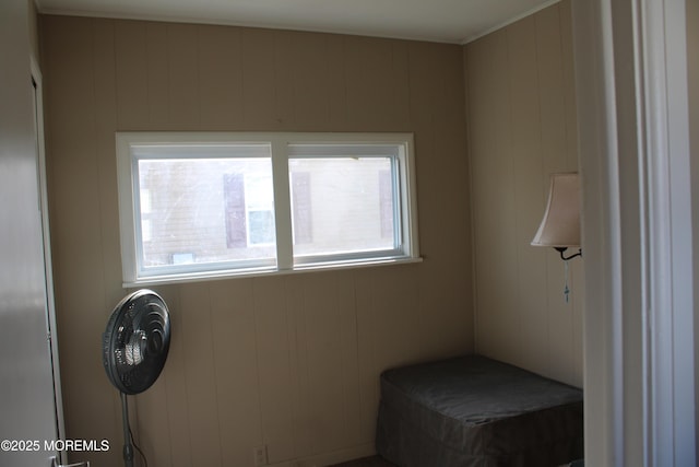 unfurnished bedroom with multiple windows