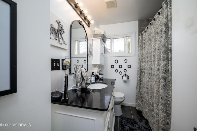 full bath featuring visible vents, baseboards, toilet, tile patterned flooring, and vanity