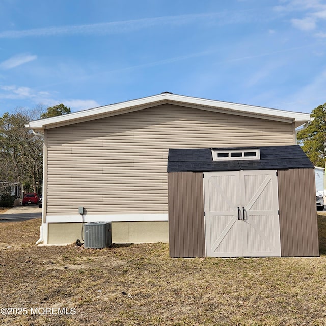 view of shed featuring cooling unit