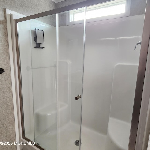 bathroom featuring a stall shower