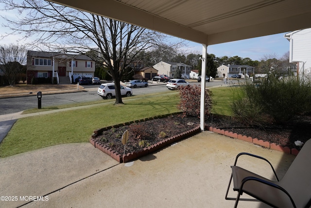 view of patio / terrace with a residential view