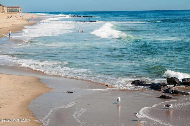 view of water feature with a view of the beach