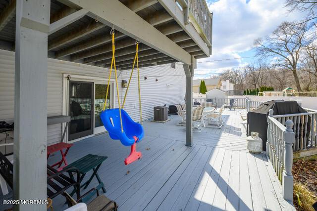 deck with central AC unit