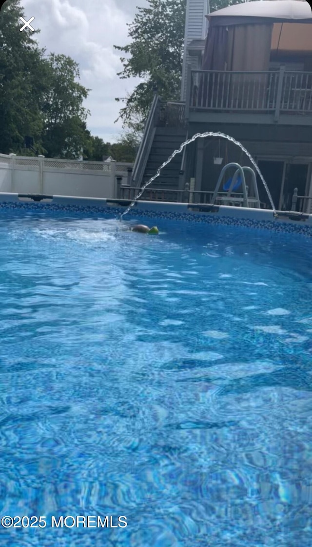 outdoor pool with stairway