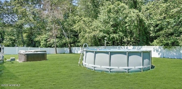 view of yard with a fenced backyard and a fenced in pool