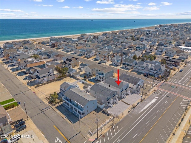 aerial view with a residential view and a water view