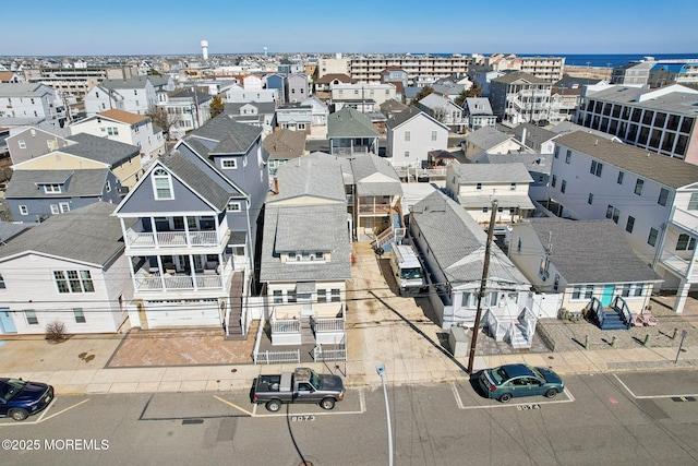 birds eye view of property with a residential view