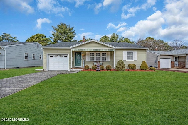 ranch-style home featuring a chimney, a front lawn, decorative driveway, and an attached garage