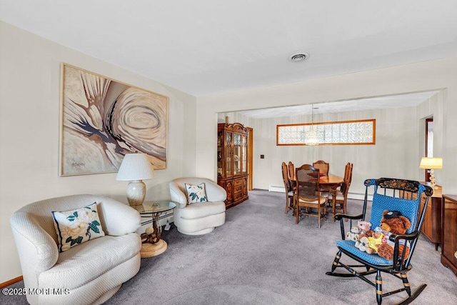 sitting room with carpet floors and visible vents