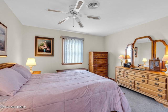 bedroom featuring ceiling fan, carpet floors, and visible vents