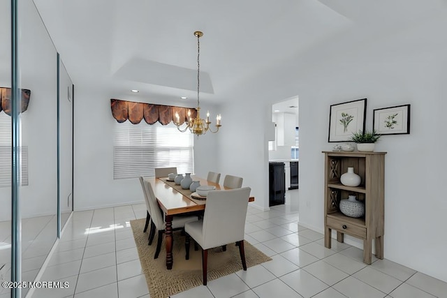 dining area featuring an inviting chandelier, light tile patterned flooring, recessed lighting, and baseboards