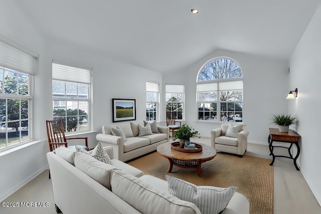 2978 Springwater Ct, Toms River, NJ 08755 - carpeted living room with vaulted ceiling and baseboards