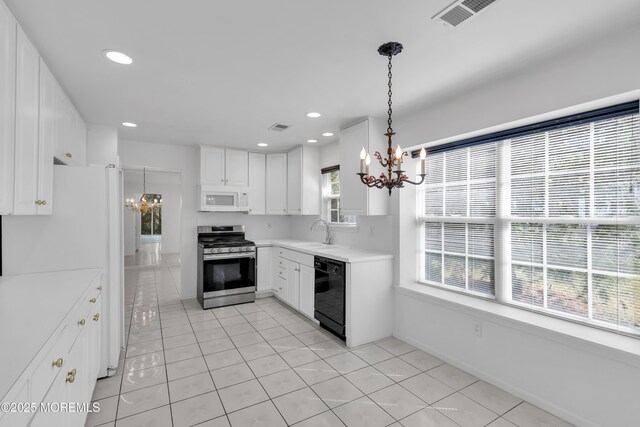 2978 Springwater Ct, Toms River, NJ 08755 - kitchen with visible vents, light countertops, an inviting chandelier, white appliances, and a sink