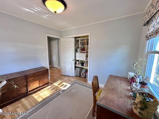 office with wood finished floors and baseboards