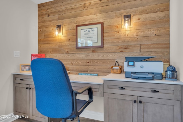 office featuring wooden walls