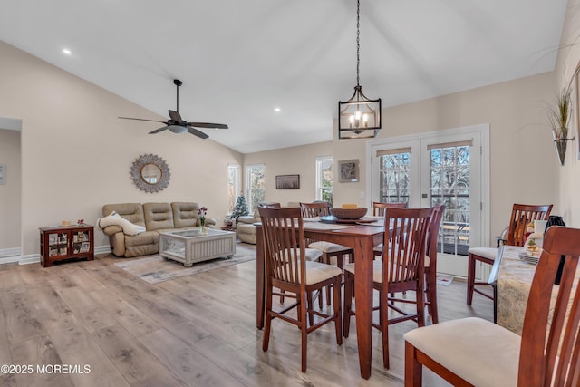 dining room with french doors, lofted ceiling, recessed lighting, a ceiling fan, and light wood-type flooring