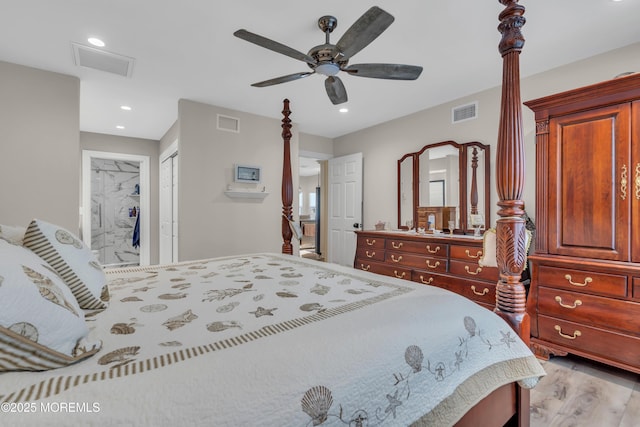 bedroom with light wood finished floors, visible vents, a closet, and recessed lighting