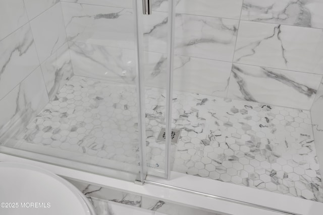 details with a marble finish shower