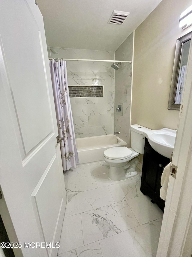 full bathroom featuring visible vents, toilet, shower / tub combo, marble finish floor, and vanity