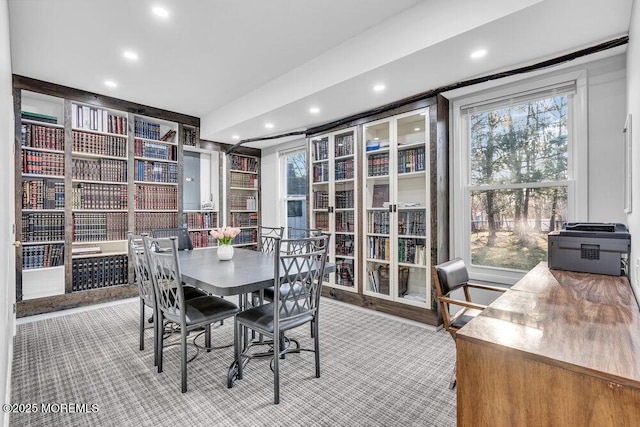 dining space featuring recessed lighting