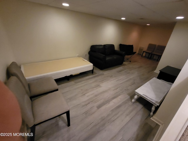 living area featuring recessed lighting and wood finished floors