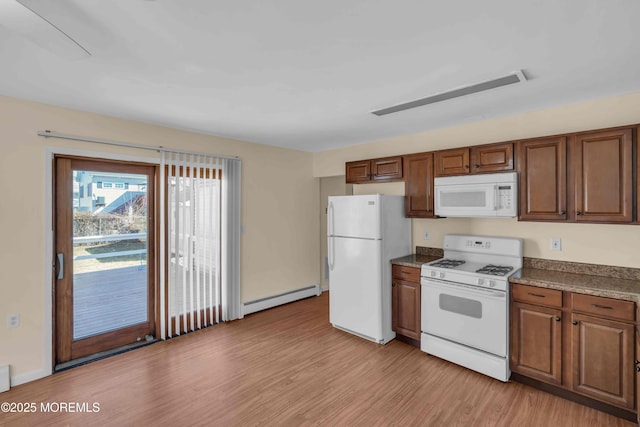 kitchen with a baseboard heating unit, white appliances, baseboards, brown cabinets, and light wood finished floors