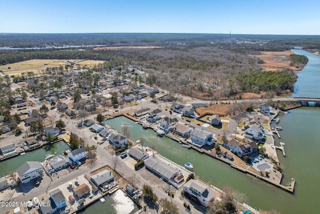 aerial view featuring a residential view and a water view