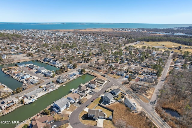 aerial view featuring a water view and a residential view