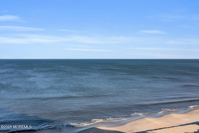 view of water feature with a view of the beach