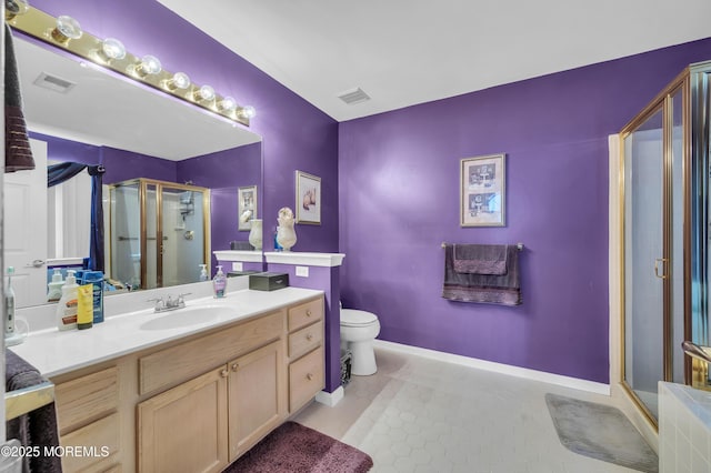 full bathroom with visible vents, a shower stall, vanity, and tile patterned floors