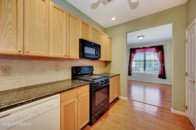 kitchen featuring tasteful backsplash, visible vents, light wood-type flooring, black appliances, and light brown cabinets