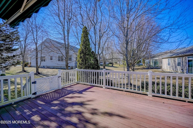 wooden deck with a residential view