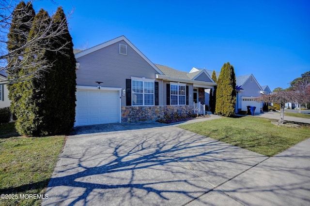 ranch-style home featuring an attached garage, stone siding, concrete driveway, and a front yard