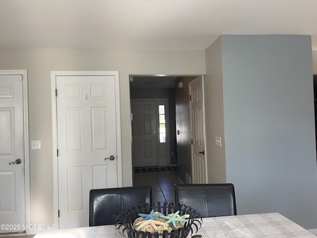 dining space featuring tile patterned floors