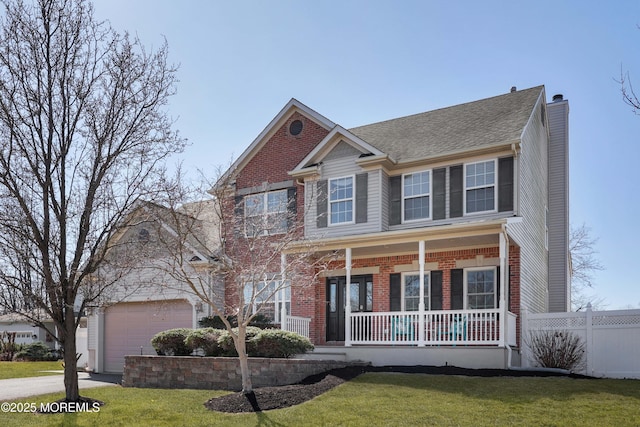 view of front facade featuring brick siding, covered porch, driveway, and fence