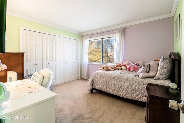 bedroom with a closet, light carpet, and ornamental molding