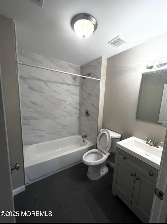 bathroom featuring toilet, shower / bath combination, visible vents, and vanity