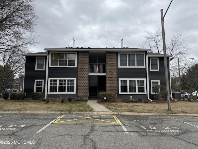 view of building exterior featuring central AC unit