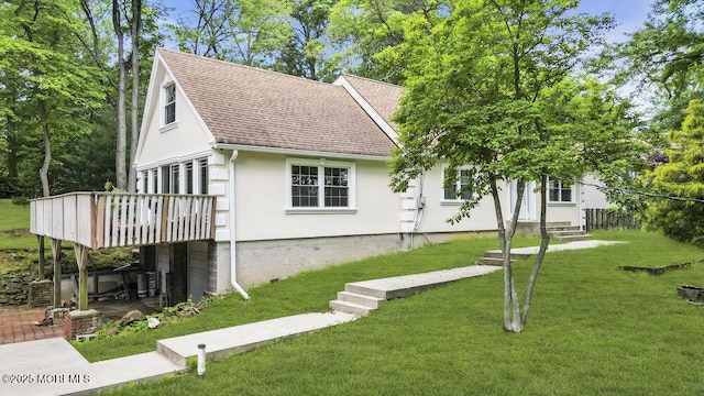 136 Van Brackle Rd, Matawan, NJ 07747 - view of front of home featuring a shingled roof, a deck, a front yard, stucco siding, and entry steps